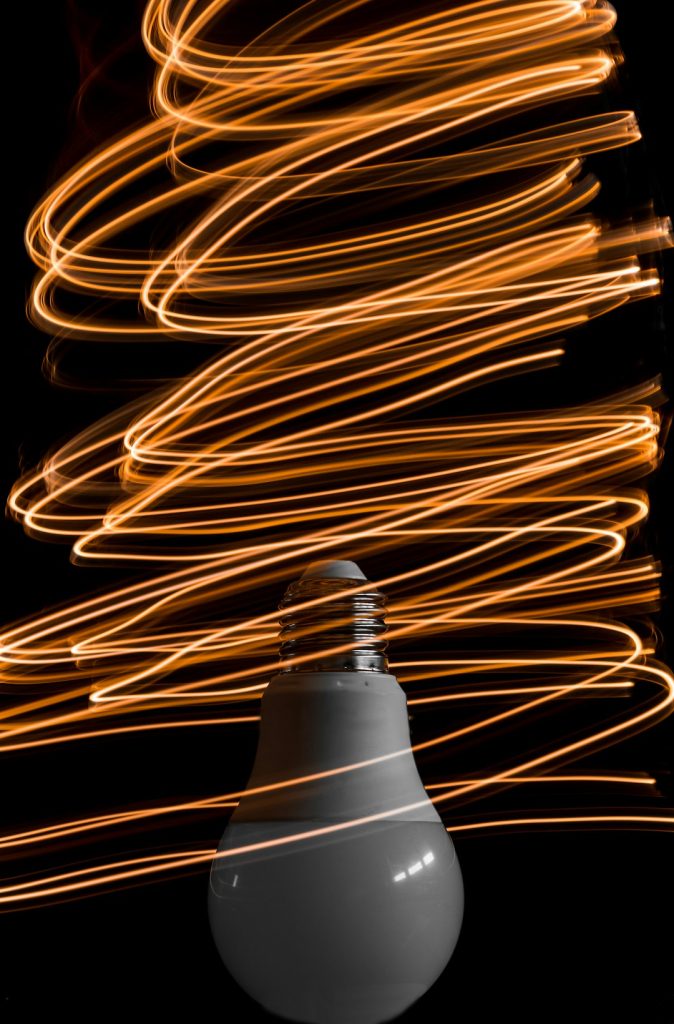 light bulb recycling compliance yellow light bulb ready to be recycled under weee regulations
